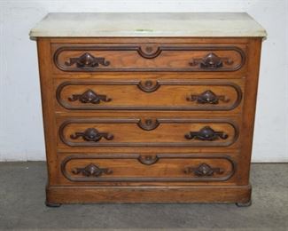 Chestnut marble top low chest w/ race track molding