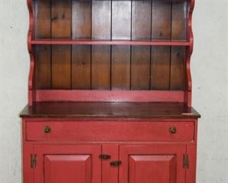 Red painted kitchen cupboard