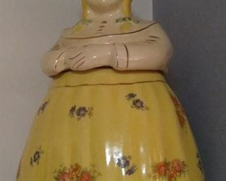 My first Cookie Jar - since I was a young child in the 1950's. Cooky (name in Gold on shoulder) - Dutch Lady with Gold trim and Flower Decals by Shawnee Pottery