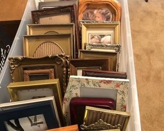 Lots of  picture frames, mirrors 
