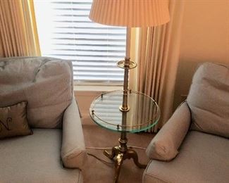 three legged brass floor lamp with shelf