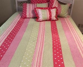 bedroom 1 is perfect for your girl, wicker and pink, wicker headboard is $95, queen mattress set $150, comforter bedding set $35