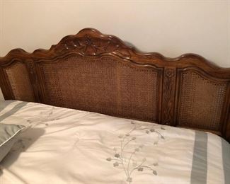 Drexel headboard, carved on top with cane, model Italian Provincial $225