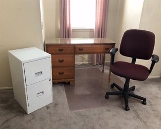 small office upstairs, desk and chair, filing cabinet gone