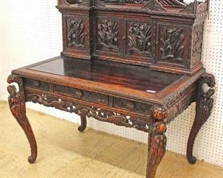  Late 19th Century Early 20th Century Highly Carved and Ornate Asian Hardwood Desk with Fancy Top

Auction Estimate $700-$1200 – Located Inside 