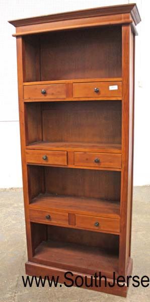  It's the peak a boo bookcase (hide some show some 🙂

Mahogany Finish Open Front Bookcase with 6 Drawers

Auction Estimate $200-$400 – Located Inside 