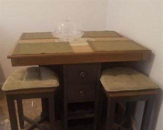Kitchen table solid with storage draws plus 4 chairs. $275