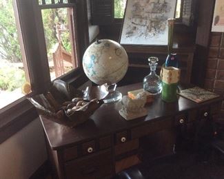 Cool decor, globe, copper bowl with stones, pottery and glassware