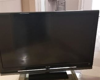 SONY 52 INCH FLATSCREEN TV WITH REMOTE & SONY SURROUND SOUND SYSTEM