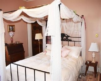 Charming queen size wrought iron canopy bed