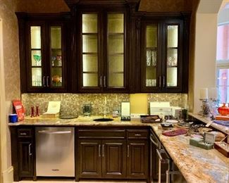 Kitchen Wet Bar includes Cabinetry, Counter, Appliances