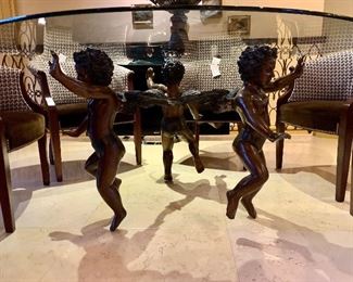 Bronze Dancing Cherubs - Dining Table with Round Glass Top