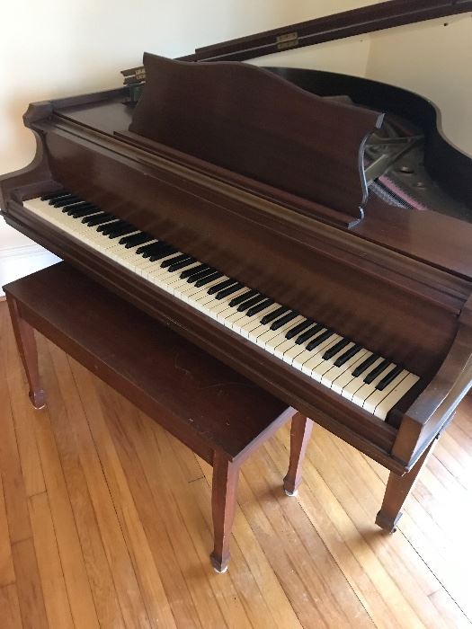 Beautiful vintage baby grand piano