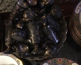Sterling salt and pepper shakers. Shot glasses, cordials glasses