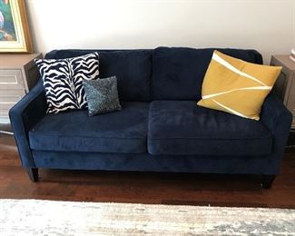 West Elm Navy Blue ultra suede upholstered sofa.  $500.00