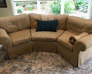 Curved upholstered sofa, down cushions $500.00