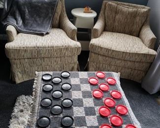 Two Barrel Chairs and a Game Board. 