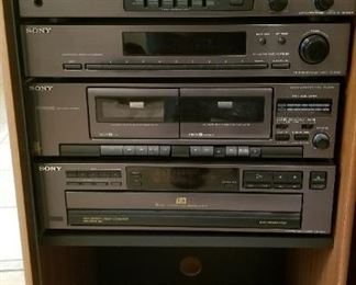 Sony stereo tower cabinet with CD, cassette tape,  radio and synthesizer