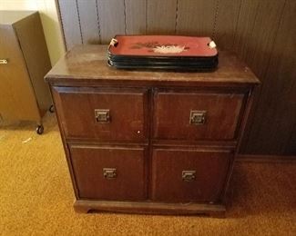 front of radio cabinet and vintage trays