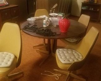 mid century table and 4 chairs