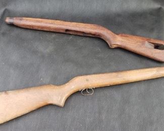 2 rifle stocks. 1 with trigger assembly. 1 with markings. https://ctbids.com/#!/description/share/314376