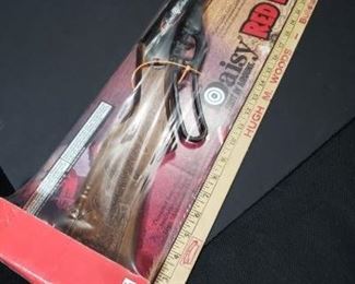 Daisy Red Ryder Limited Edition 60th Anniversary Air Riffle in original packaging. Measures Length 35 inches and Height 6 1/2 inches.  https://ctbids.com/#!/description/share/314479