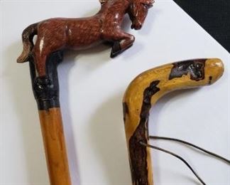 Cane with horse carvings and multicolored cane. https://ctbids.com/#!/description/share/314495