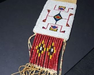 Suede Beaded Native American Bag with Tassels.  https://ctbids.com/?site=1#!/description/share/314470