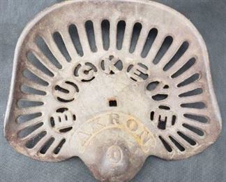 Aultman Miller & Co cast iron Buckeye Akron tractor seat.  https://ctbids.com/?site=1#!/description/share/314371