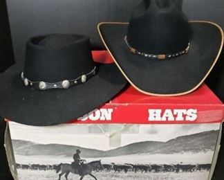 Black Resistol Hat Size 56/7. Measures Length 16 inches, Height 7 inches and Width 13 inches. Black Miller Hat Size Large. Measures Length 15 1/2 inches, Height 5 inches and Width 13 inches. Includes Stetson Hat Box.  https://ctbids.com/?site=1#!/description/share/314490