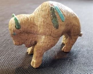 Marble Buffalo by Frank Tom.  He carved  this from a wonderful piece of Picasso marble. Approximately 3 inches tall.  https://ctbids.com/?site=1#!/description/share/314533