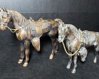 Pair of Bronze Horse Figurines. Large Horse measures Height 7 inches and Length 9 Inches. Small Horse measures Height 5 1/2 inches and Length 7 inches. https://ctbids.com/?site=1#!/description/share/314475