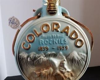 1959 Jim Beam Decanter Colorado Centennial 1859-1959 Rush to the Rockies Vintage. https://ctbids.com/?site=1#!/description/share/314527