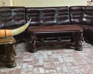 Custom made seating with wood carved horse heads