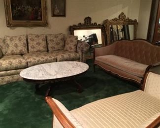 Furniture and large gilded mirrors