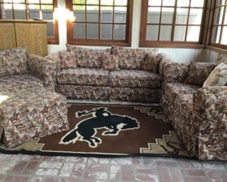 These are slip covered! See the previous picture, with white duck upholstery. 