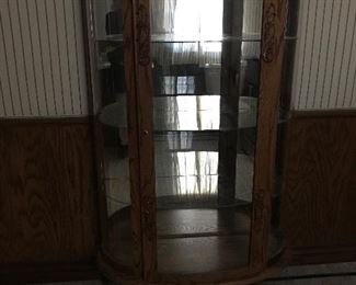 Curved glass display cabinet
