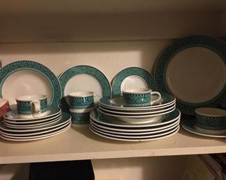 Mikasa dishes - service for 12. One dinner plate has a chip. See bottom plate in stack.