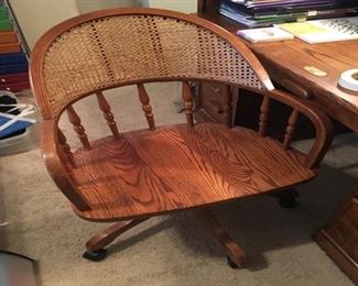 Matching desk chair....wood split down middle.Desk chaiar.