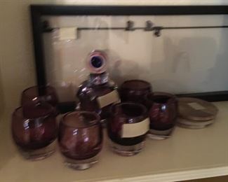 small drink glasses....small decanter. It is not a set but looks close enough in color to match.