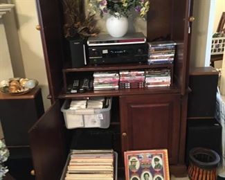 albums, tv cabinet, dvd's, cd's