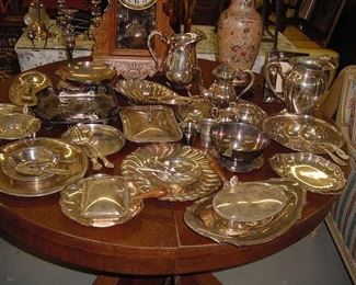 silverplated items, round oak table