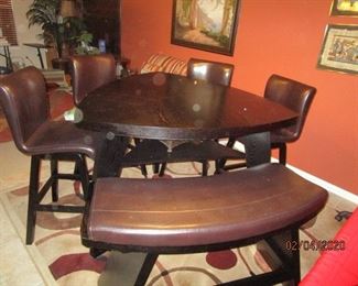 Unique Dining Table.  3 Sided table.  4 chairs and Bench. Excellent condition. Solid and Heavy.