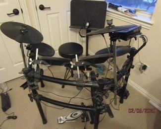 Simmons Electronic Drum Set. Excellent Condition. Amp sold Separately. TAMA seat and sticks included.