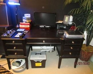Black desk.  5 drawers.  Excellent condition