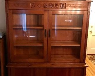 Chinese teak mid century modern two piece China cabinet