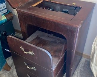 Dark wood sewing machine
