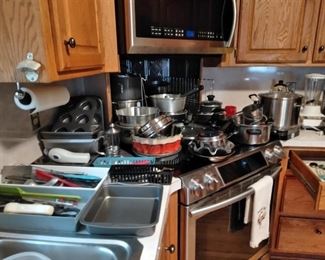 lots of kitchen wares, and cookwares