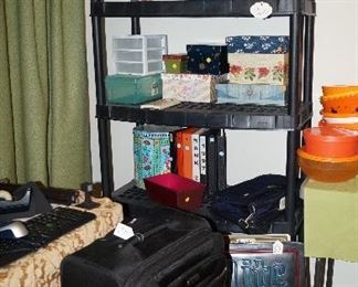 shelving, luggage, storage boxes, tins, Miller Lite sign