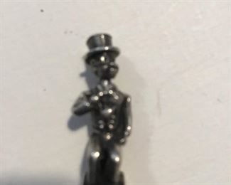 Black Mistrial sterling charm .  Does any one know the history of who they where made for and who would have worn them ?company that copyright charm was started circa 1941 .......$85